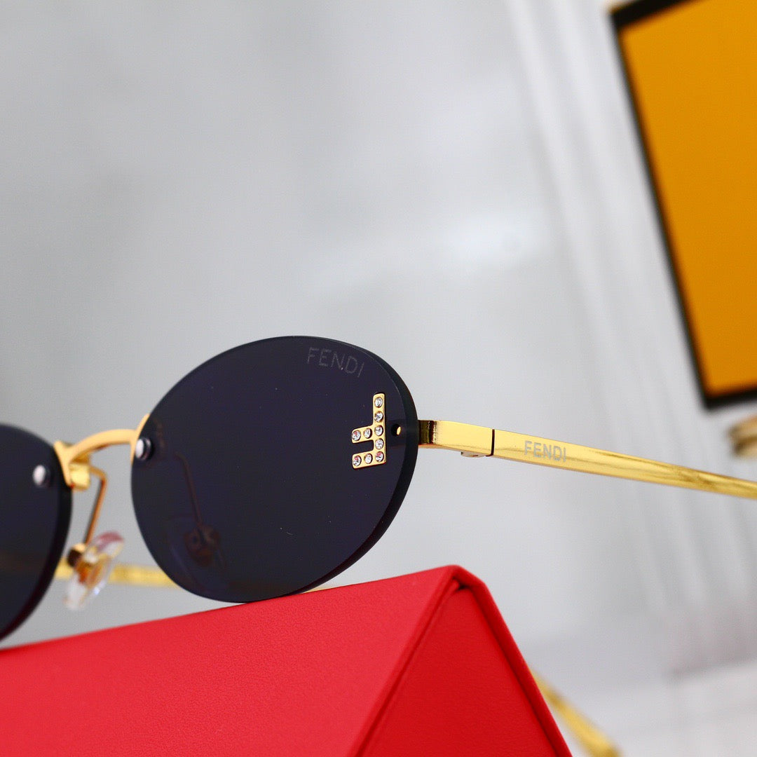 Lunettes de soleil ovales vintage en métal sans monture
