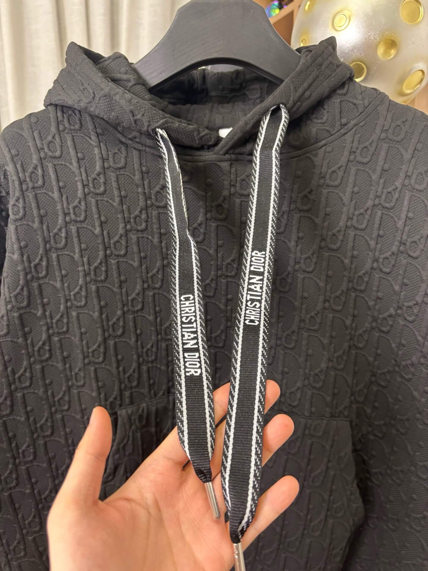 All-Over Embossed Print Hoodie