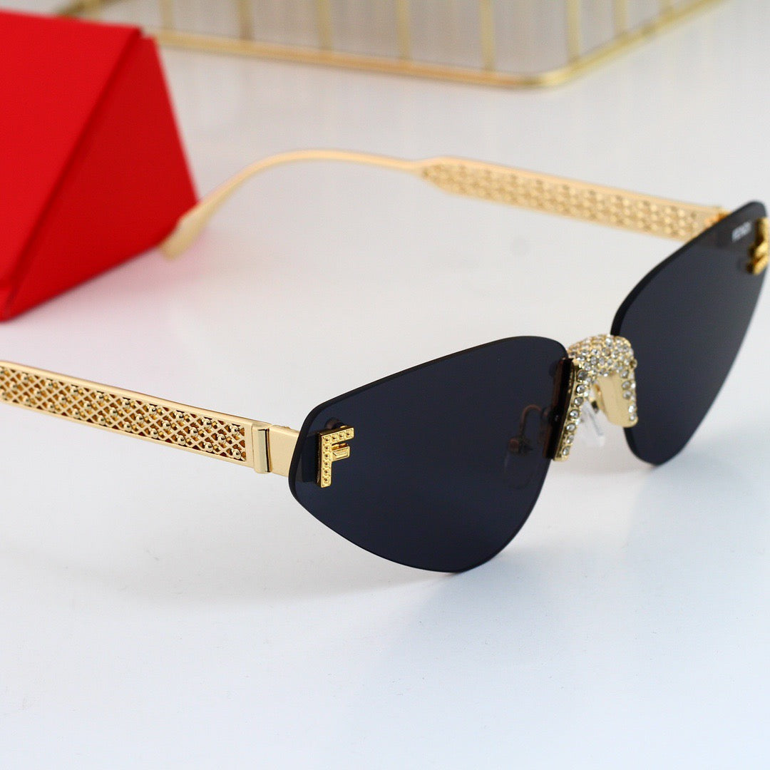 Lunettes de soleil œil de chat à strass