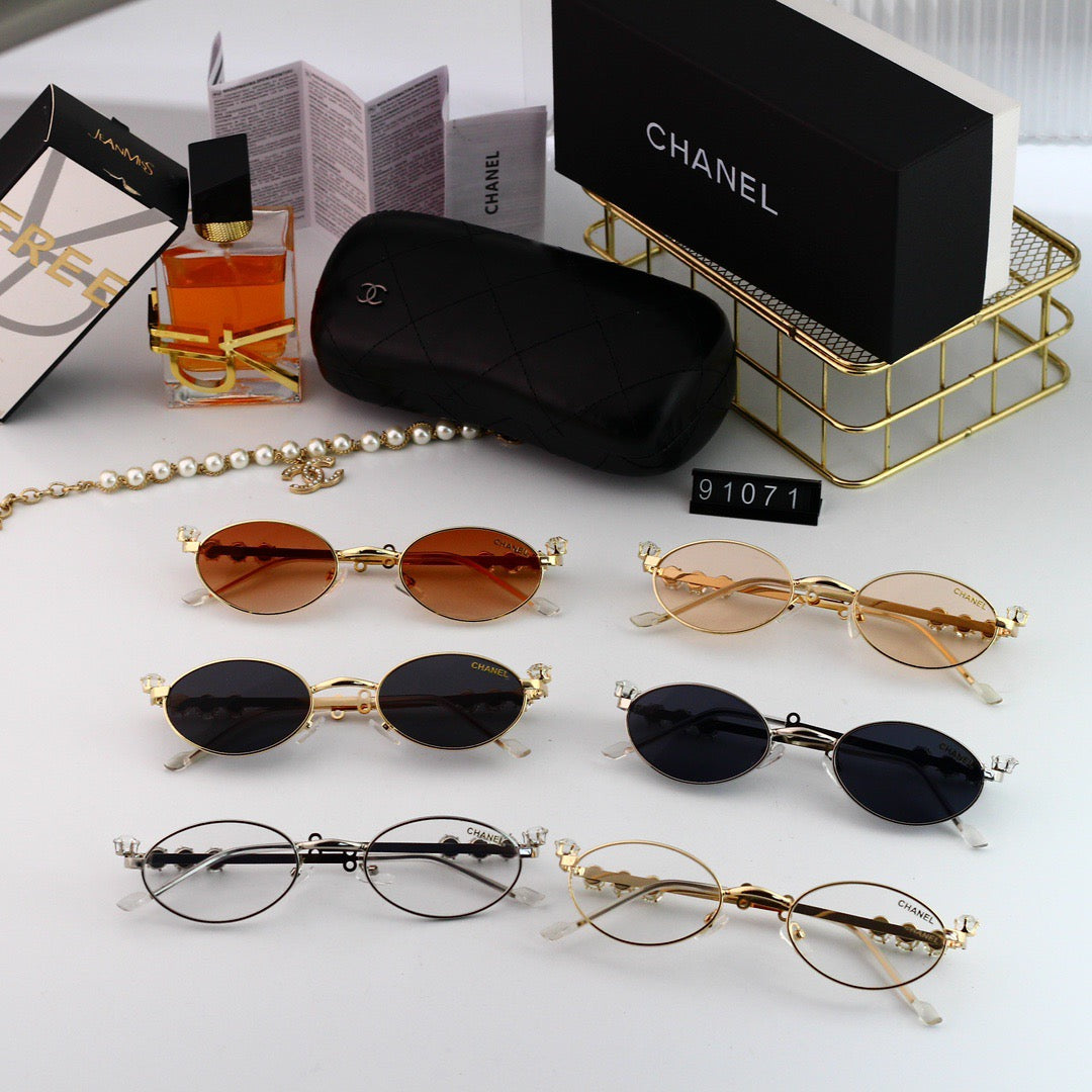 Lunettes de soleil modernes à petite monture en métal