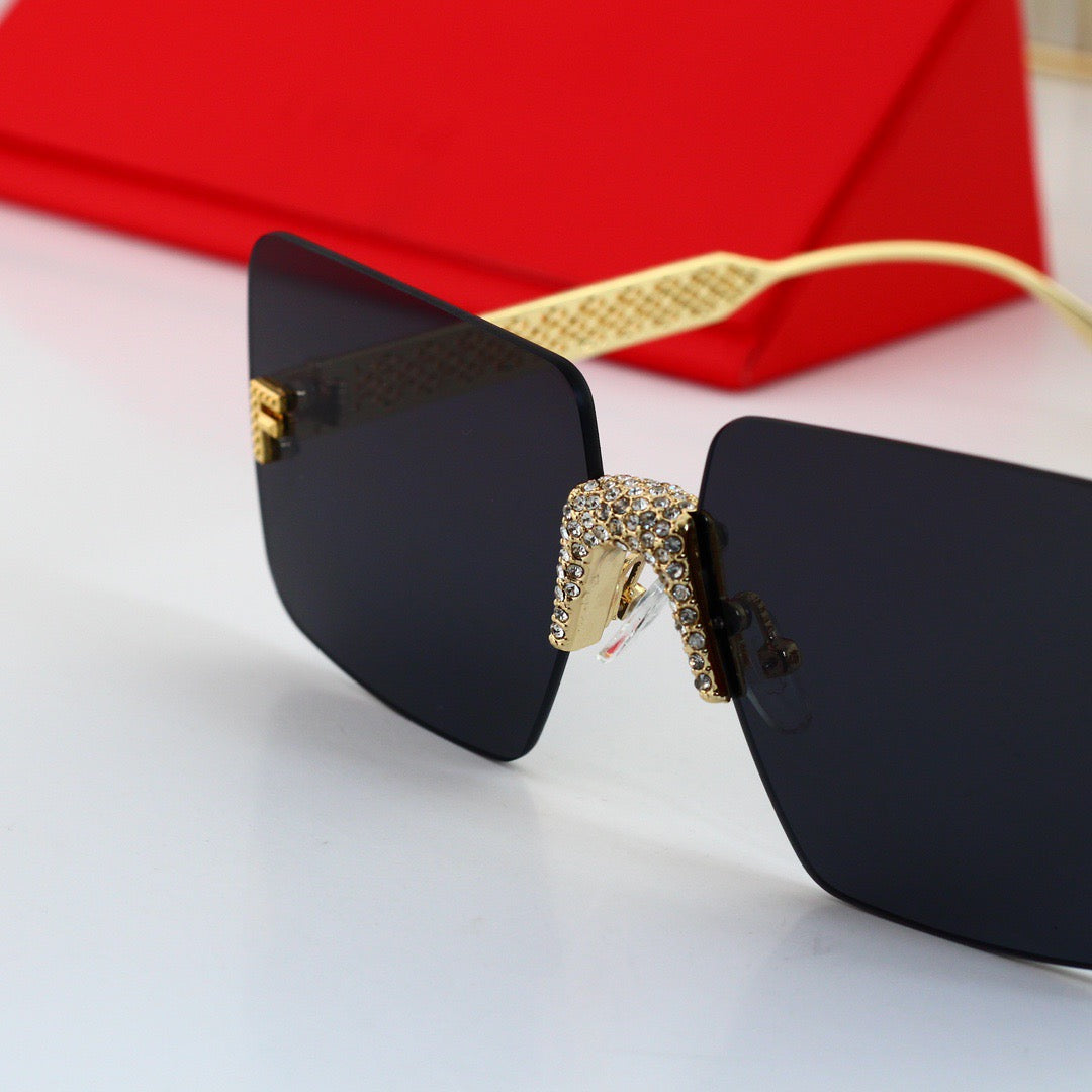 Lunettes de soleil luxueuses sans monture en strass