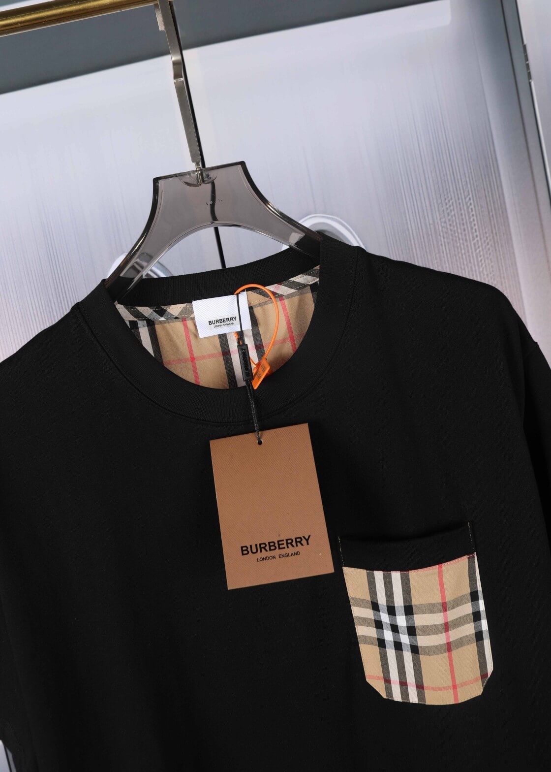 T-shirt à carreaux avec poche