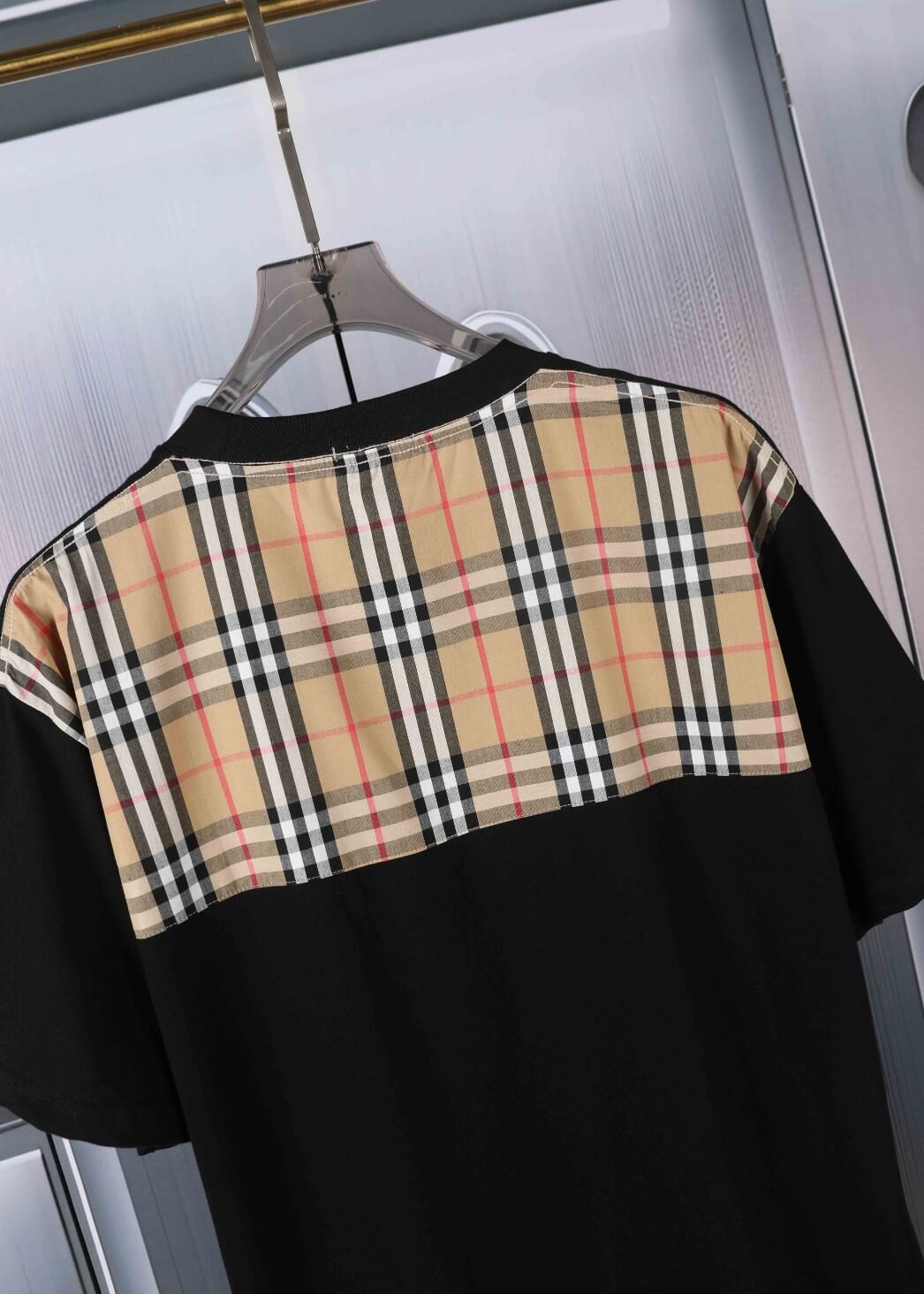 T-shirt à carreaux avec poche