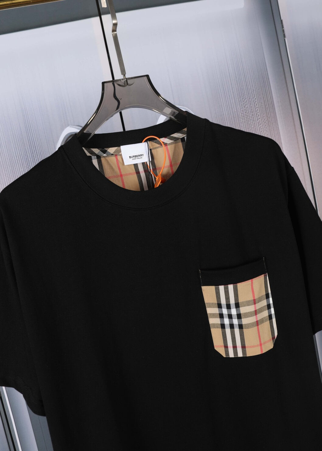 T-shirt à carreaux avec poche