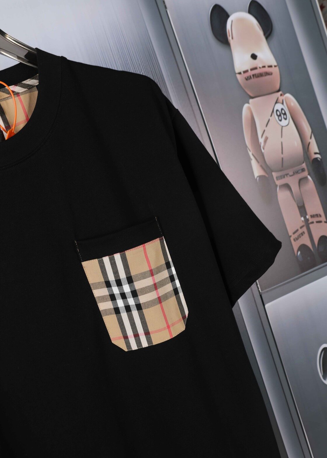 T-shirt à carreaux avec poche