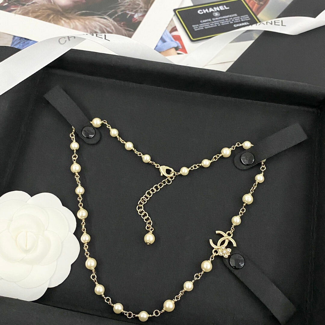Classic Pearl Necklace with Metal Accents