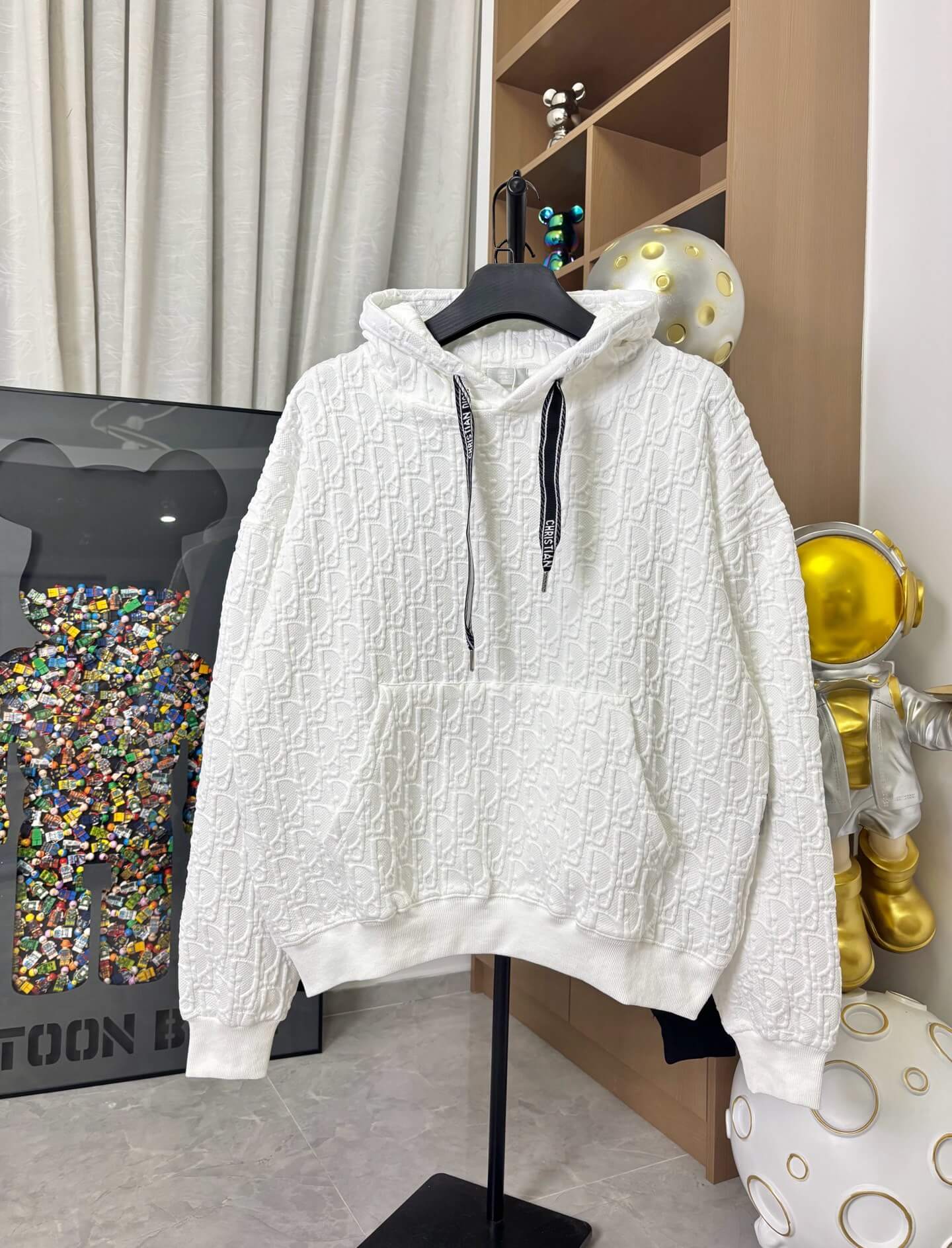 All-Over Embossed Print Hoodie